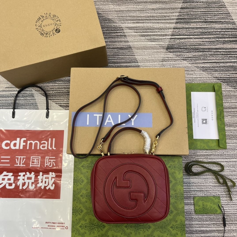 G*u*i top handle bags